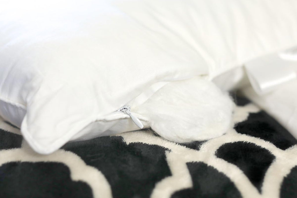 Silk Bedding Direct. Pair of Silk-Filled Pillows. Top Grade Long-Strand Mulberry Silk Wrapped Around a Microfiber Inner Core for Perfect Support. King Size, 36' x 20'. Rest Your Dreams on Mulberry Sil