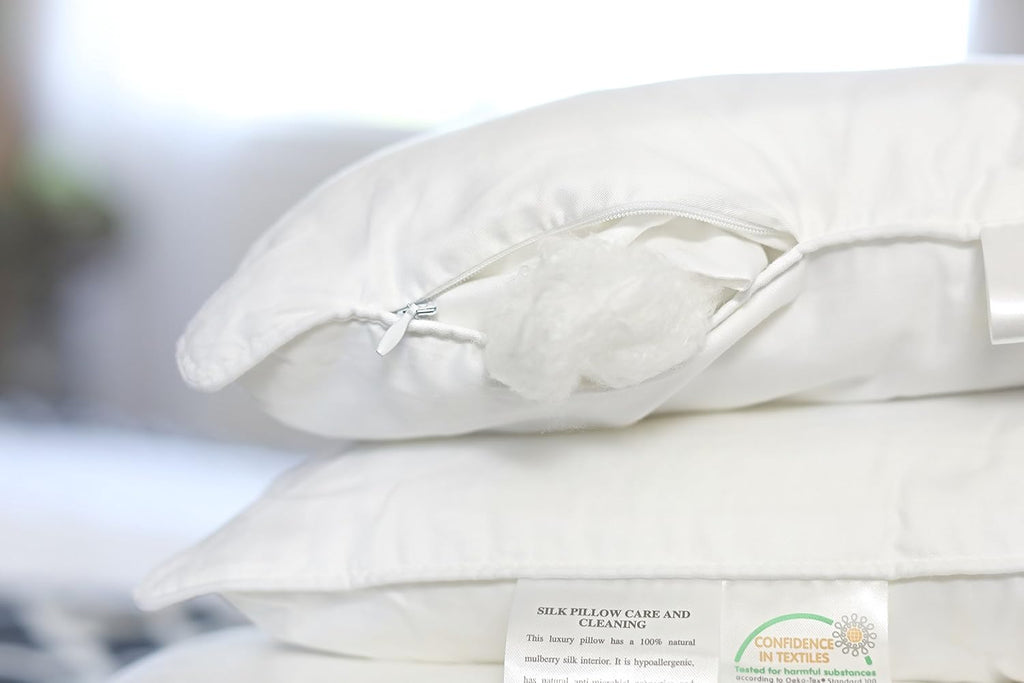 Silk Bedding Direct. Pair of Silk-Filled Pillows. Top Grade Long-Strand Mulberry Silk Wrapped Around a Microfiber Inner Core for Perfect Support. King Size, 36' x 20'. Rest Your Dreams on Mulberry Sil